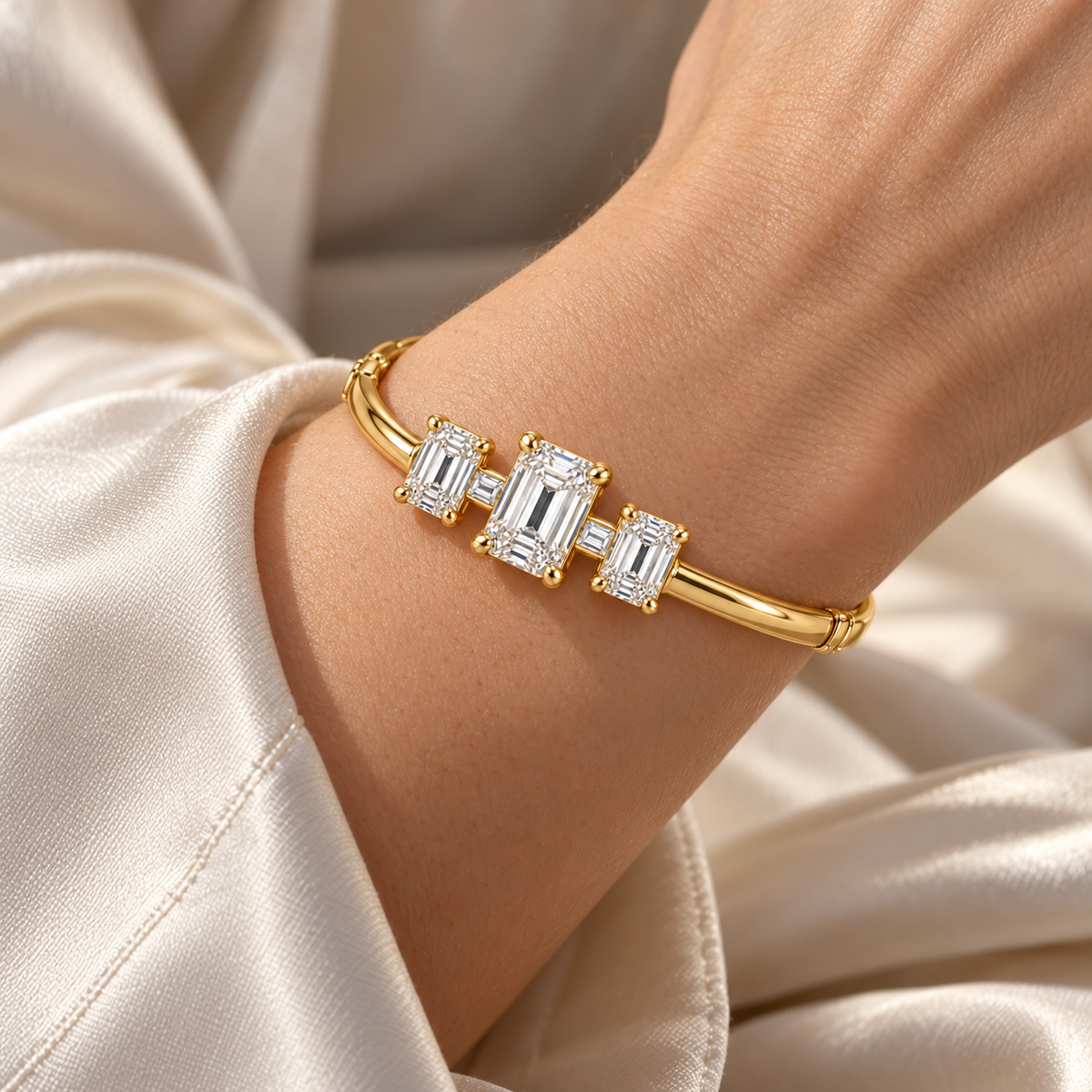 MISSISSI Emerald Ladder diamond oval bangle in yellow gold, worn view