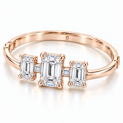 MISSISSI Emerald Ladder diamond oval bangle in pale champagne rose gold, three-quarter view