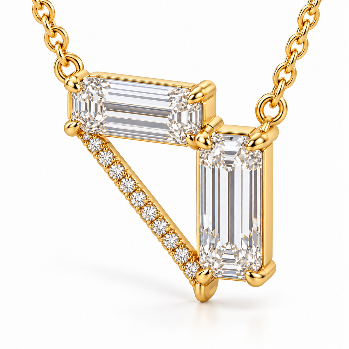 MISSISSI Z08 yellow gold-tone necklace, three quarter view showing a horizontal emerald-cut diamond, a vertical emerald-cut drop and a diagonal line of round diamonds forming an open triangle; design visualization
