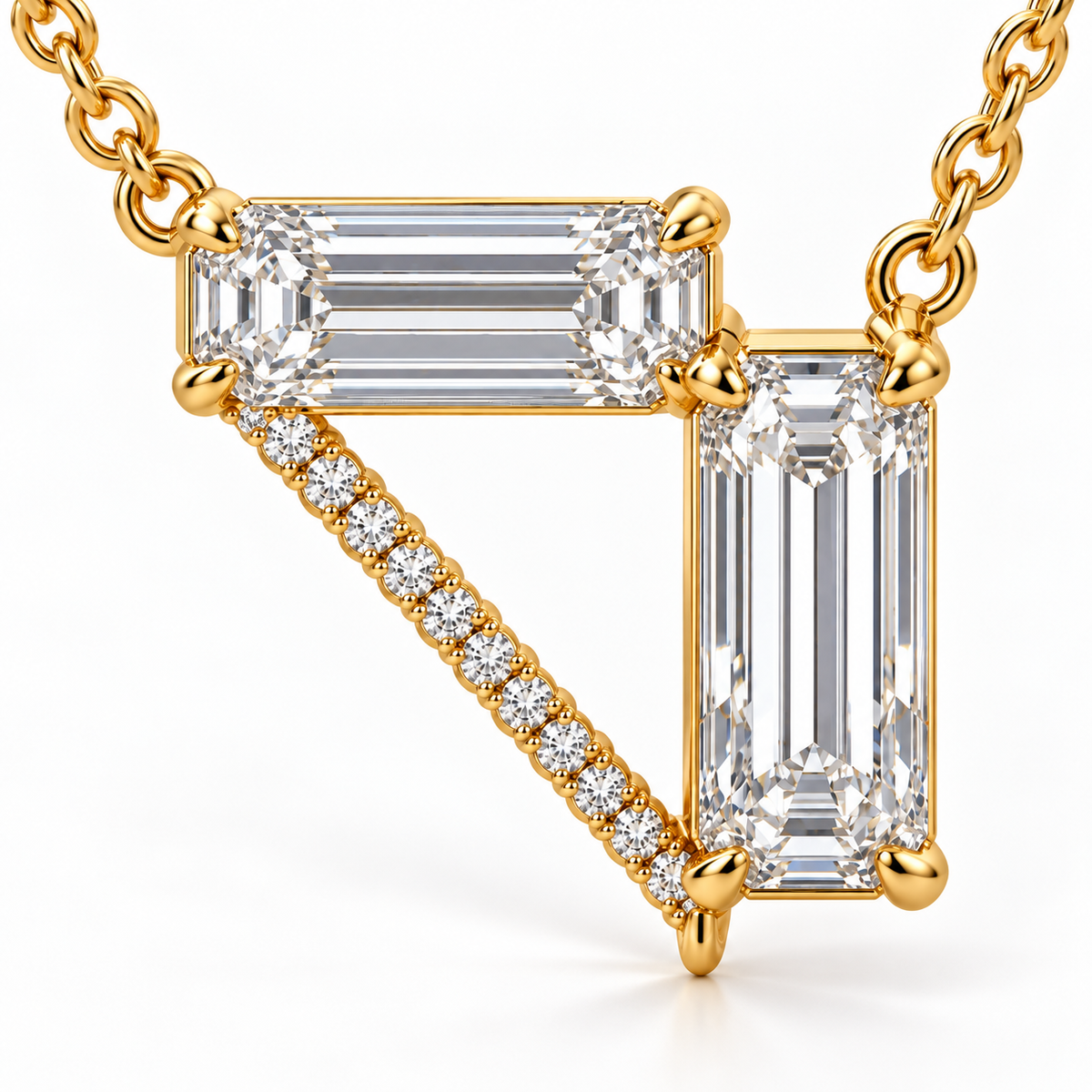 MISSISSI Z08 yellow gold-tone necklace, macro detail view showing a horizontal emerald-cut diamond, a vertical emerald-cut drop and a diagonal line of round diamonds forming an open triangle; design visualization