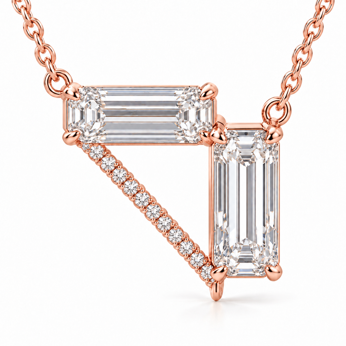 MISSISSI Z08 pale rose gold-tone necklace, hero view showing a horizontal emerald-cut diamond, a vertical emerald-cut drop and a diagonal line of round diamonds forming an open triangle; design visualization